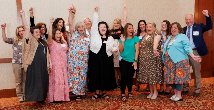 celebratory group picture of early educators