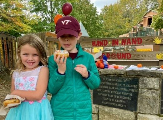 two children at a fall event